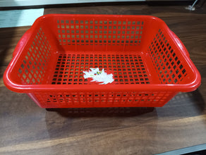 Plastic fruit and vegetable washing basket, versatile dish rack for kitchen organization.