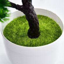 Artificial plant in round pot with a modern look