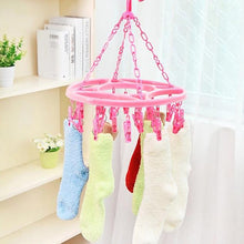 Clothes hanging clips, sturdy design, on a hanger