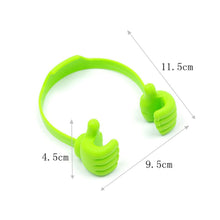 Unique hand-shaped mobile phone holder, perfect for office and home use.