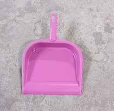 Plastic dustpan with handle, suitable for multiple cleaning tasks.