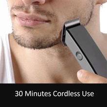 Cordless trimmer for beard grooming and hair cutting.